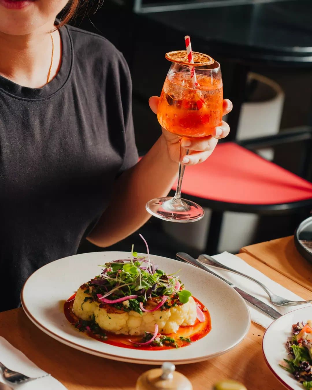 A spritz served with a rosti stack