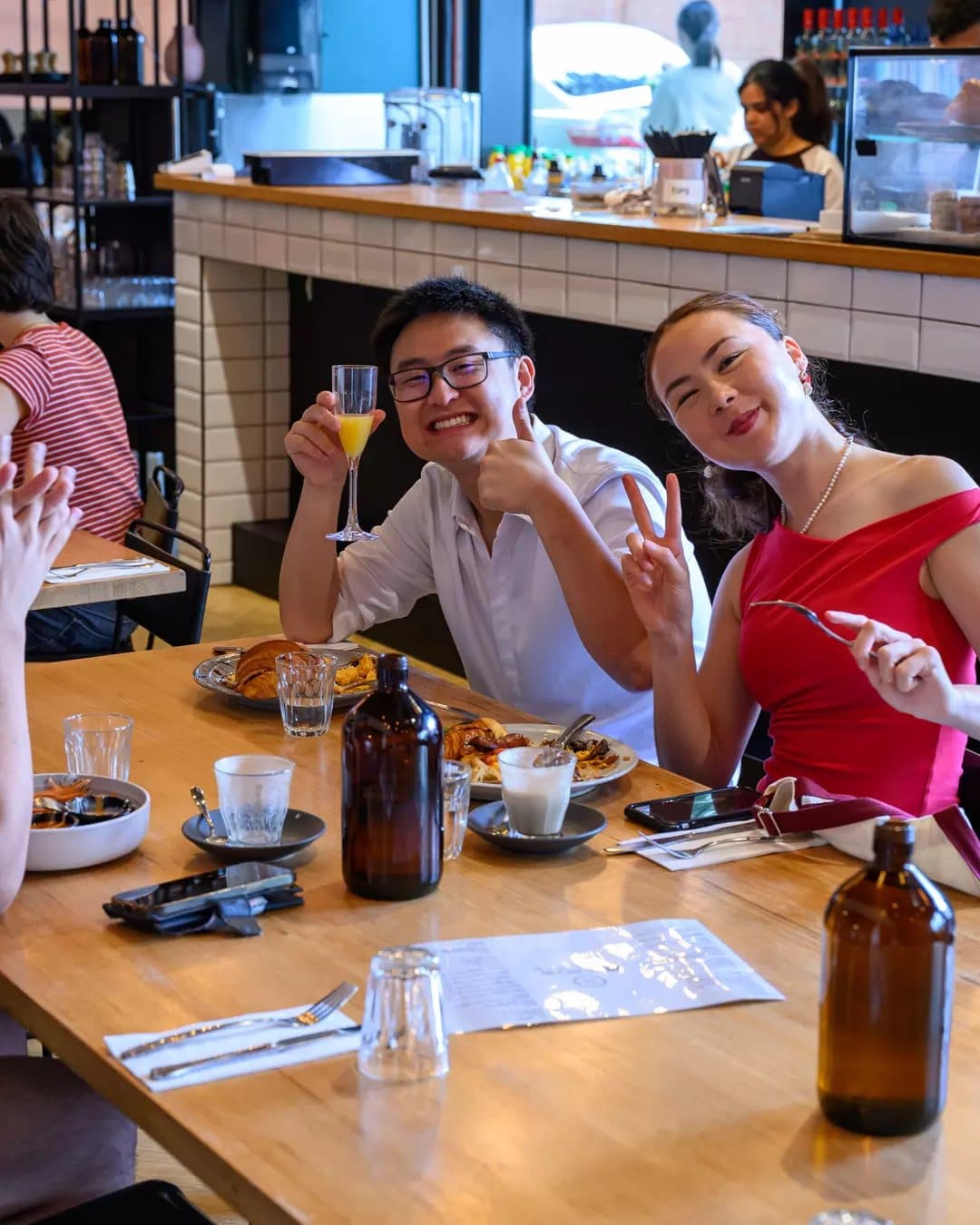 Friends sharing brunch at MAROO